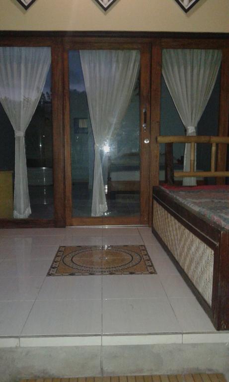 Kadek Homestay Amed Esterno foto