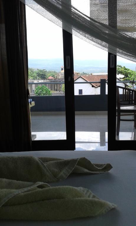 Kadek Homestay Amed Esterno foto
