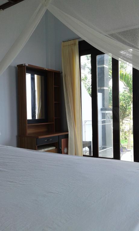 Kadek Homestay Amed Esterno foto