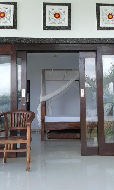 Kadek Homestay Amed Esterno foto
