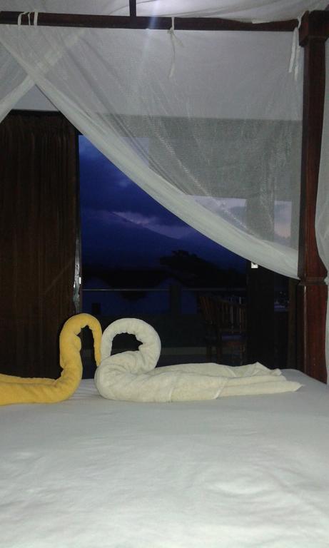 Kadek Homestay Amed Esterno foto
